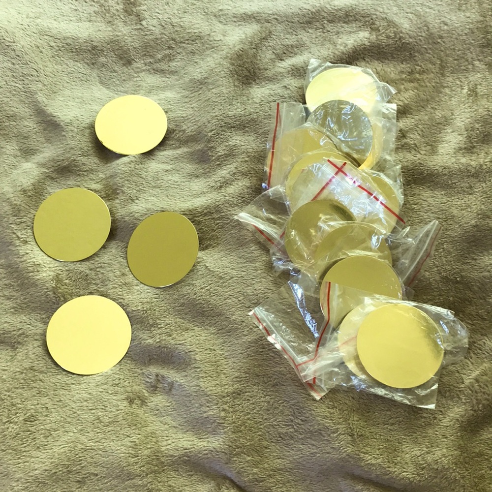 Gold metal circle wall art